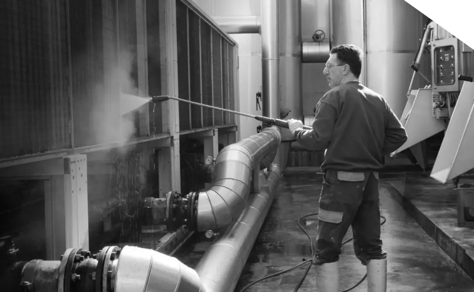 Industrial hydro jet cleaning in progress
