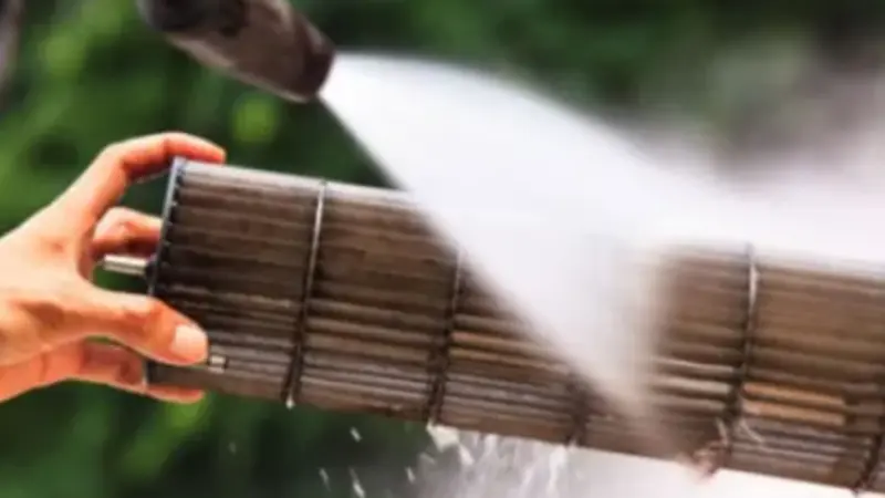 Industrial air filter being cleaned