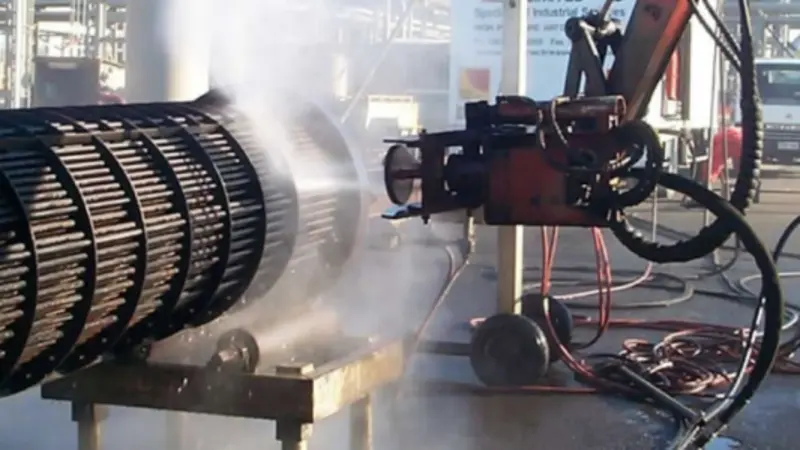 Condenser cleaning equipment in operation